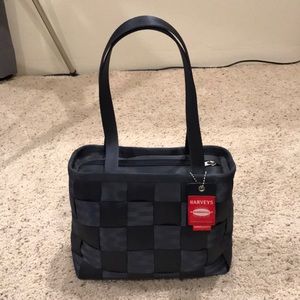 Harvey’s original seatbelt purse
